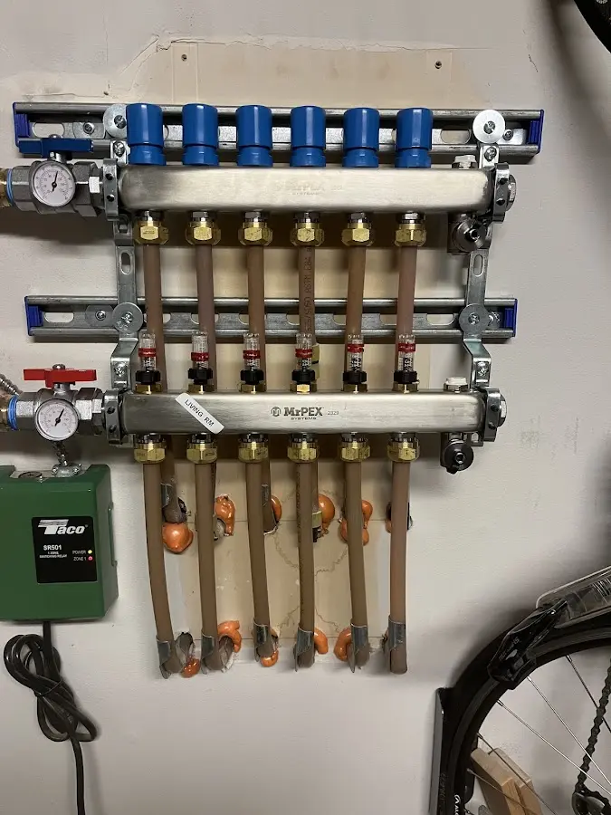 Plumber performing Water Heater Repair at a residential property in Sunset